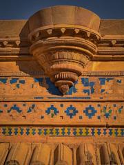 Blue and yellow tiled walls at Gwalior Fort