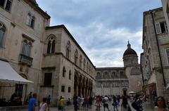 a scenic view of Old Dubrovnik with historic buildings and cobblestone streets