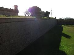 North wall and moat of Montjuïc Castle in Barcelona seen from Santa Amàlia bastion