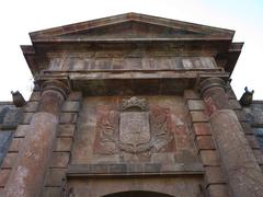 Castell de Montjuïc entrance portal with the coat of arms of Charles III in Barcelona