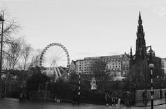 Panoramic view of Edinburgh in early December with a skyline of historic buildings and distant hills