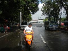 Liwasang Bonifacio gateway with Jones Bridge and Intramuros Manila in the background