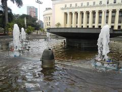 Binondo Church with New Year decorations, Plaza San Lorenzo Ruiz and Metropolitan Bank in Manila Chinatown