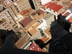 Gargoyle and shadow of El Fadrí bell tower in Castelló