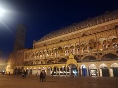 Palazzo della Ragione illuminated at night in Italy