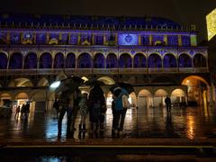 spectators admiring the Palazzo della Ragione in Padua