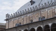 photo of an Italian monument with a clock, part of Italy's cultural heritage