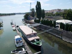 Boats and ship near Árpád Bridge in Budapest