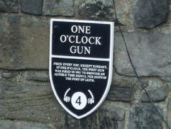 One O'Clock Gun plaque with information about the Gun and an audio guide location