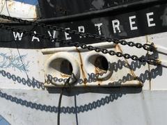 The historic Wavertree ship docked in a harbor