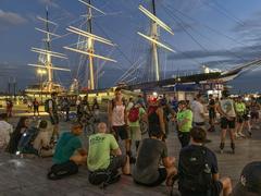 Skaters taking a break at Pier 16 with the Wavertree ship in the background