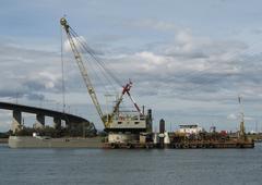 Goomai and barge Resolution during dredging operations on the Yarra River