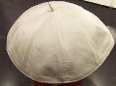 Traditional Roman Catholic skullcap called pileolus on display