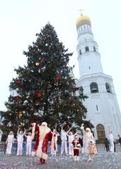 Ded Moroz and Snegurochka perform at Sobornaya Square in Moscow's Kremlin