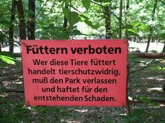 Sign indicating a feeding ban at an enclosure in Wildpark Pforzheim, Germany