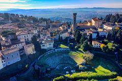 Panoramic view of Fiesole, Italy, featuring historic buildings and scenic landscape