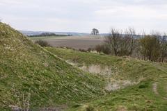 Defensive ditch of former hill fort on Castle Hill with Brightwell Barrow in the distance