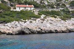 Calanque near Marseille with clear blue water and rocky cliffs