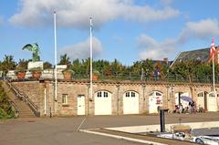 Monument to Mariners statue in Copenhagen near Kastellet with an angel figure on top of a plinth