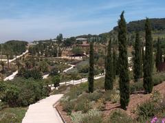 aerial view of Barcelona's Botanical Garden featuring lush greenery and walking paths