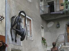 Gruyères Medieval Town with an alien sculpture