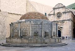 Big Onofrio's Fountain in Dubrovnik, Croatia with Church of Holy Savior in the background