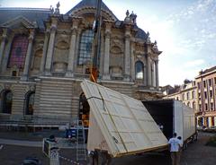 Installing Benjamin Constant's painting 'Inside Harem in Morocco' in a truck