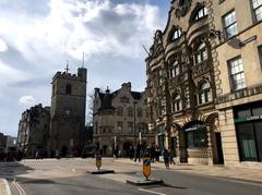 High Street in Oxford with historic buildings and blue sky