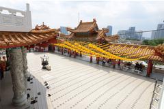 Thean Hou Temple with multi-arched gateway and red pillars