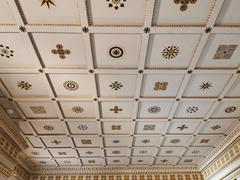 Wooden coffered ceiling with symbols in the vestibule of Villa Stuck, Munich