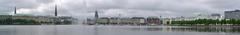 Binnenalster lake in Hamburg, Germany with buildings and blue sky