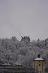 Vltava River in winter with swans and snowy banks