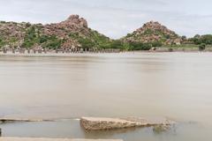 Ancient bridge of Hampi behind Vittala Temple in ruins