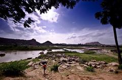 Wide angle view of the Hampi ruins with Tungabhadra River