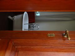 View from the washroom towards the bathroom with the bathtub