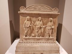 Lunese marble altar of the Lares from 2 BC in the Uffizi Gallery, Florence.