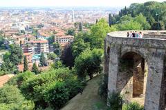 Aerial view of the city of Bergamo with its historic buildings and lush greenery