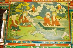 Tibetan Thanka painting depicting colorful figures and intricate designs