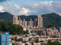 High-rise apartments near Taipei MRT Wanfang Hospital Station overlooking residential buildings and luxury homes in Wenshan District, Taipei