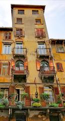 Historic building balconies in Piazza Erbe, Verona