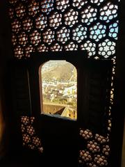 view through a window of Jaigarh Fort to Amber Palace