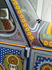 Volkswagen car decorated by Huichol artisans at the Museum of Popular Art