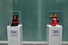 Traditional Mexican rag dolls in designer outfits