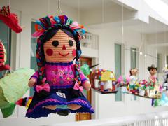 traditional doll pinata on display at Museo de Arte Popular