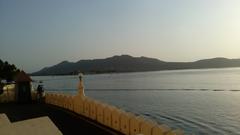 City Palace in Udaipur, Rajasthan with lake in the foreground