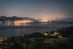 View of Évian-les-Bains at nighttime from Lavaux with Lake Geneva