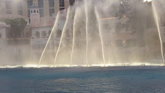 Fountains of Bellagio at night with water jets illuminated