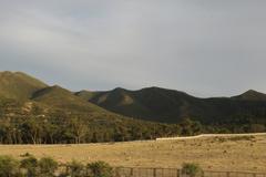 Boukornine National Park landscape with green mountains and cloudy sky