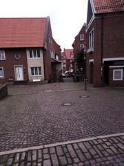 Panoramic view of Münster cityscape with historic buildings and a prominent church tower