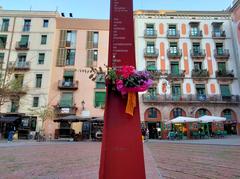 Fossar de les Moreres memorial with Albert Viaplana's bronze torch in Barcelona